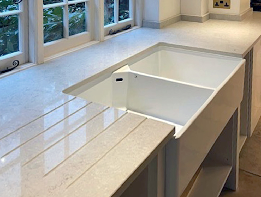 Marble quartz and stone kitchen sink and work surface installation